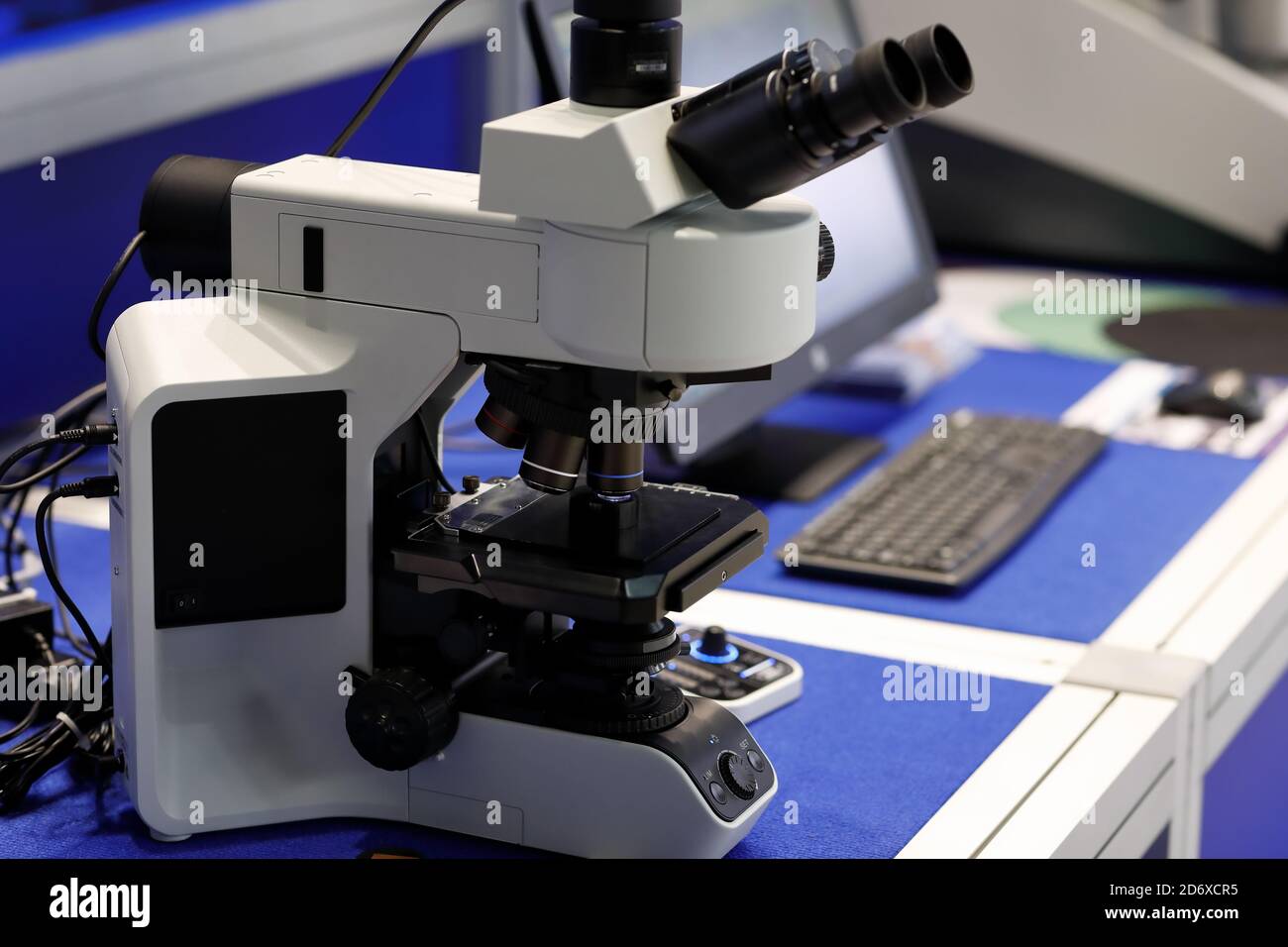 Trinocular optical microscope in a laboratory. Selective focus. Stock Photo