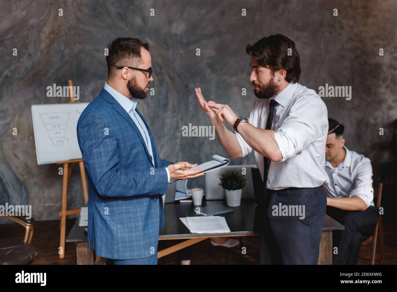 caucasian colleagues disputing having disagreement at work blaming each other in mistake, diverse coworkers arguing about project, having conflict Stock Photo