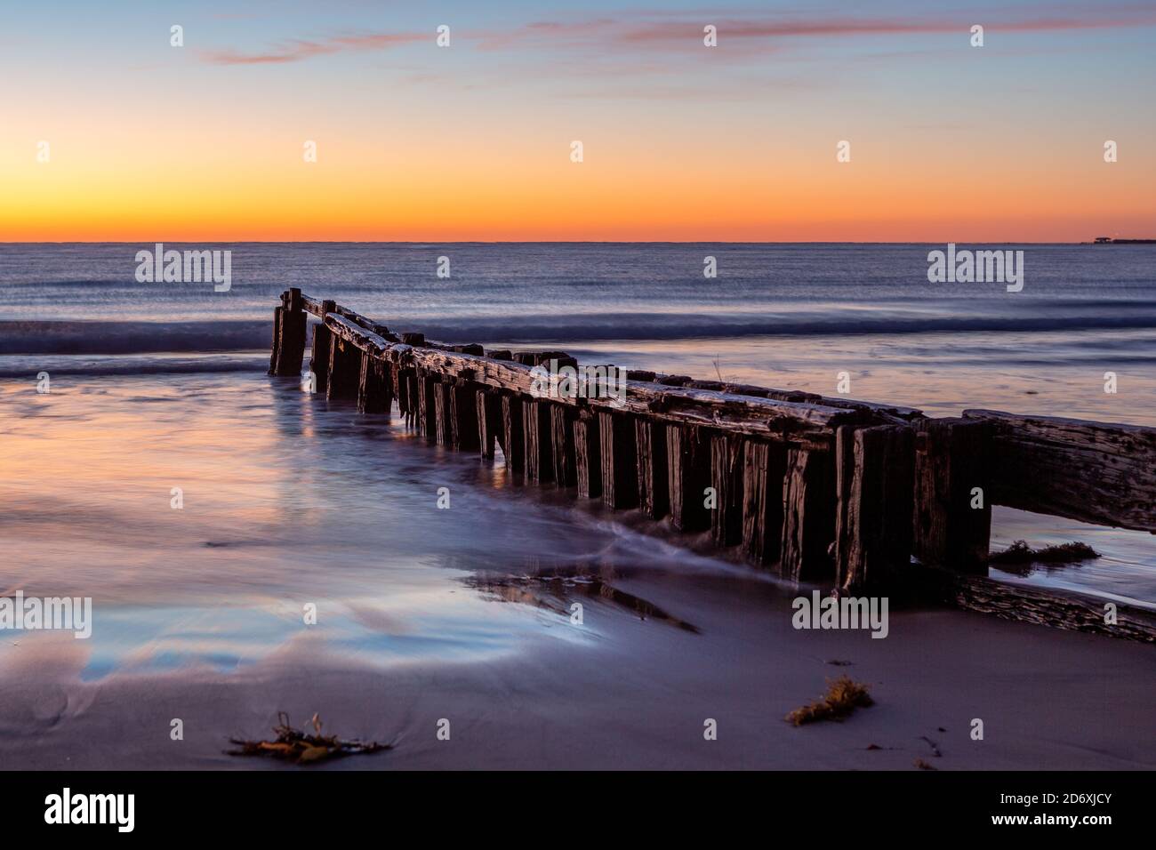 The iconic erosion groynes at sunrise in Victor Harbor South Australia on October 20 2020 Stock Photo