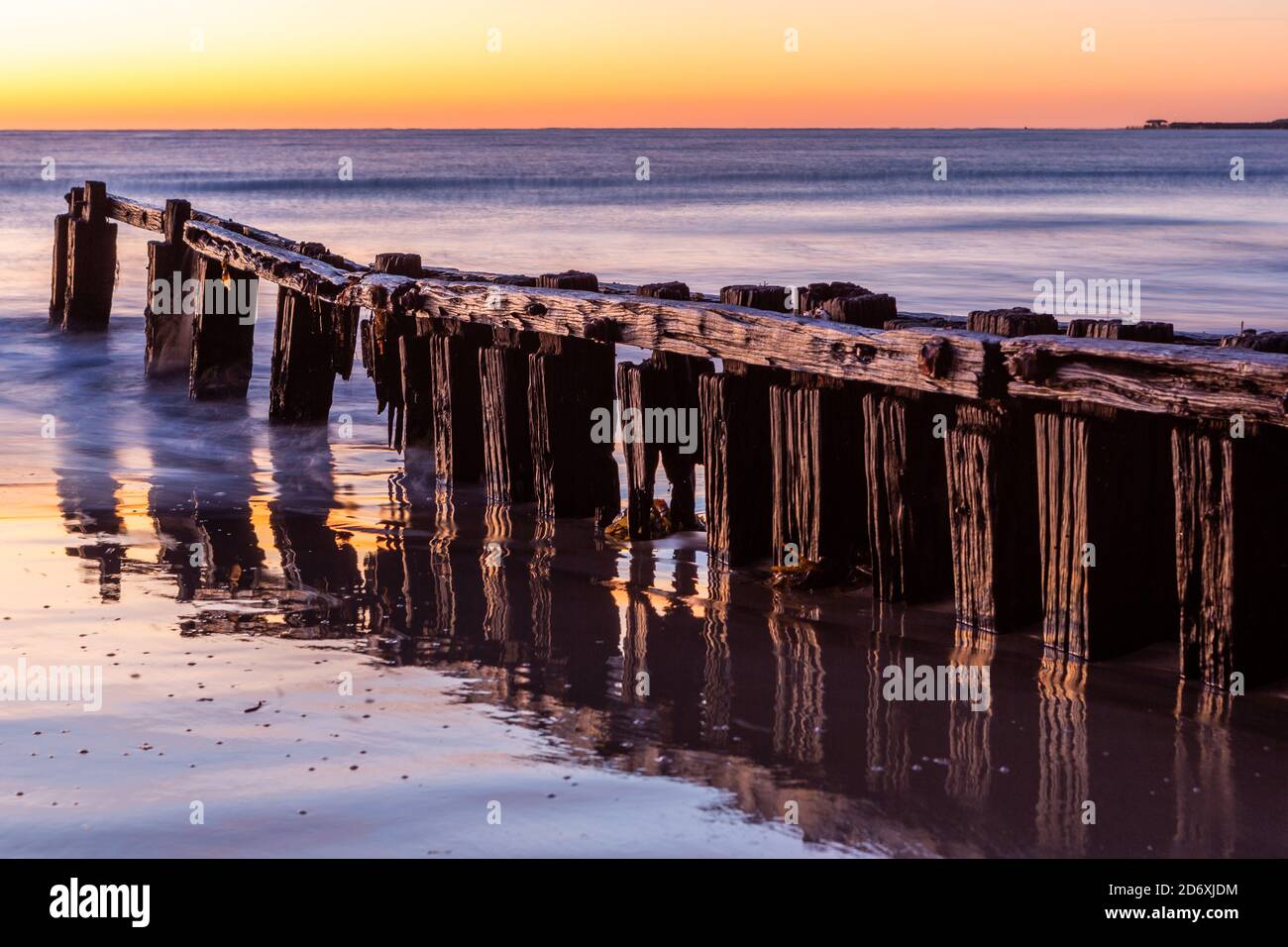 The iconic erosion groynes at sunrise in Victor Harbor South Australia on October 20 2020 Stock Photo