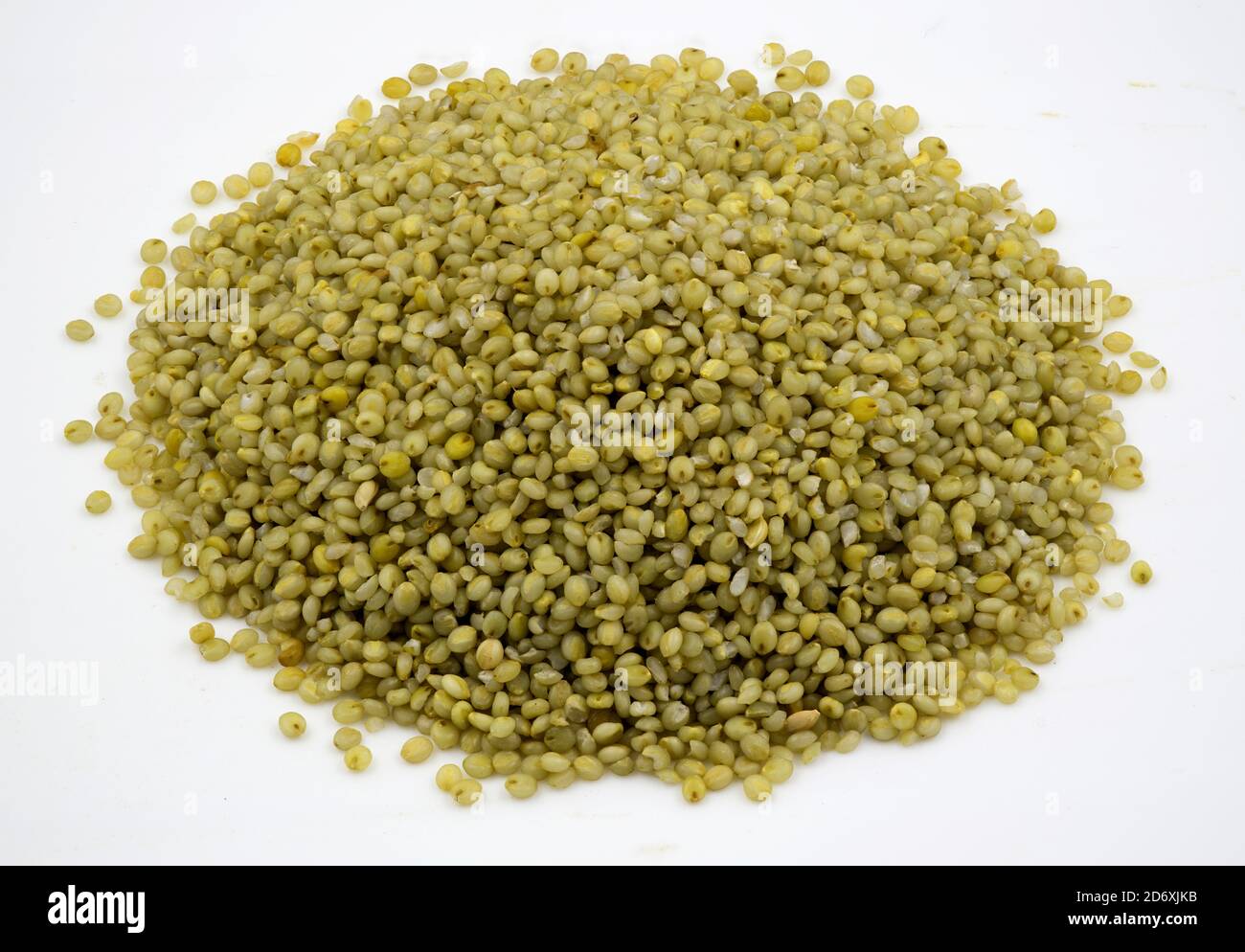 Close-up of browntop millet grains on an isolated white background Stock Photo