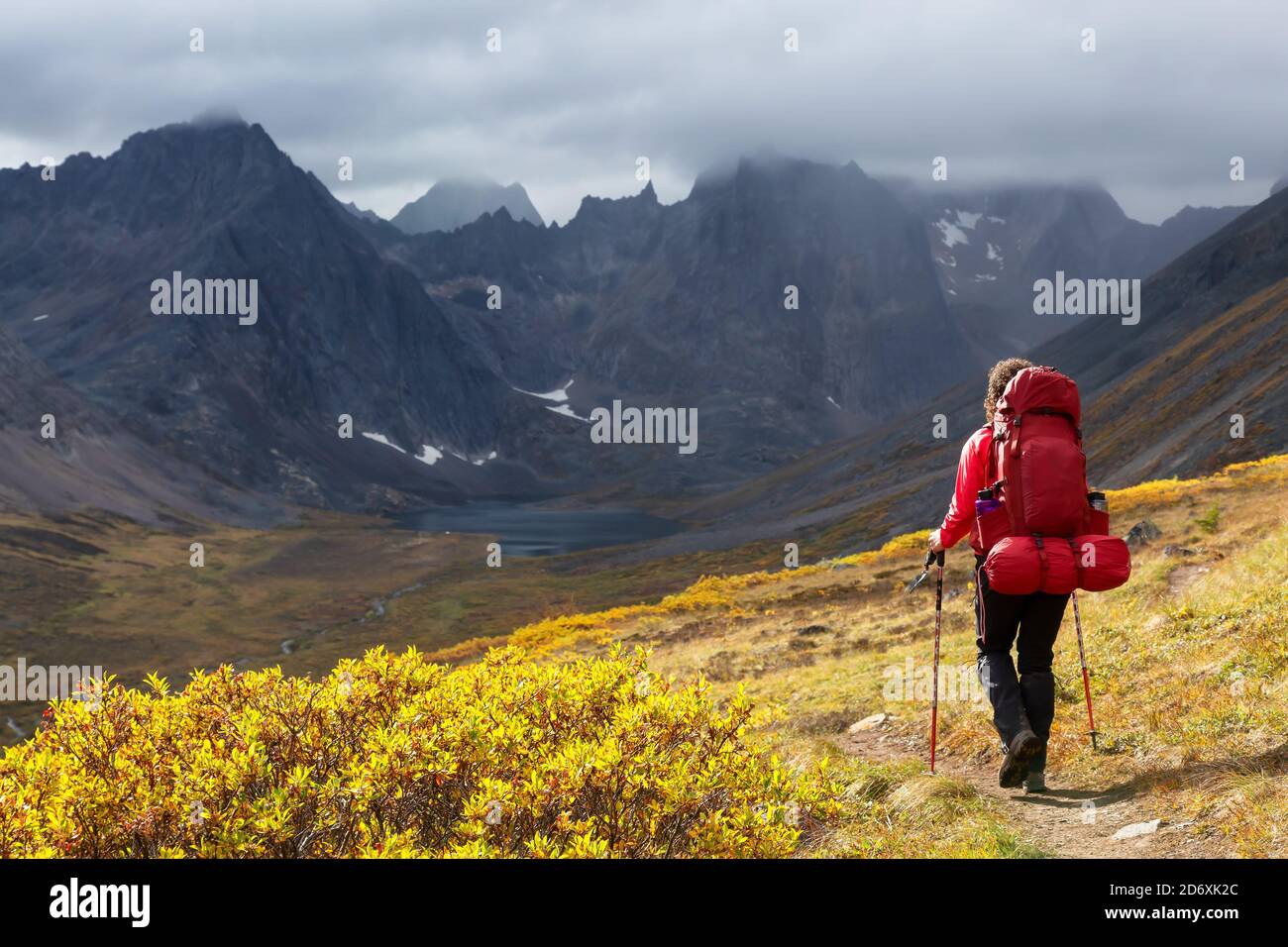 Woman Backpacking on Scenic Rocky Hiking Trail Stock Photo - Alamy