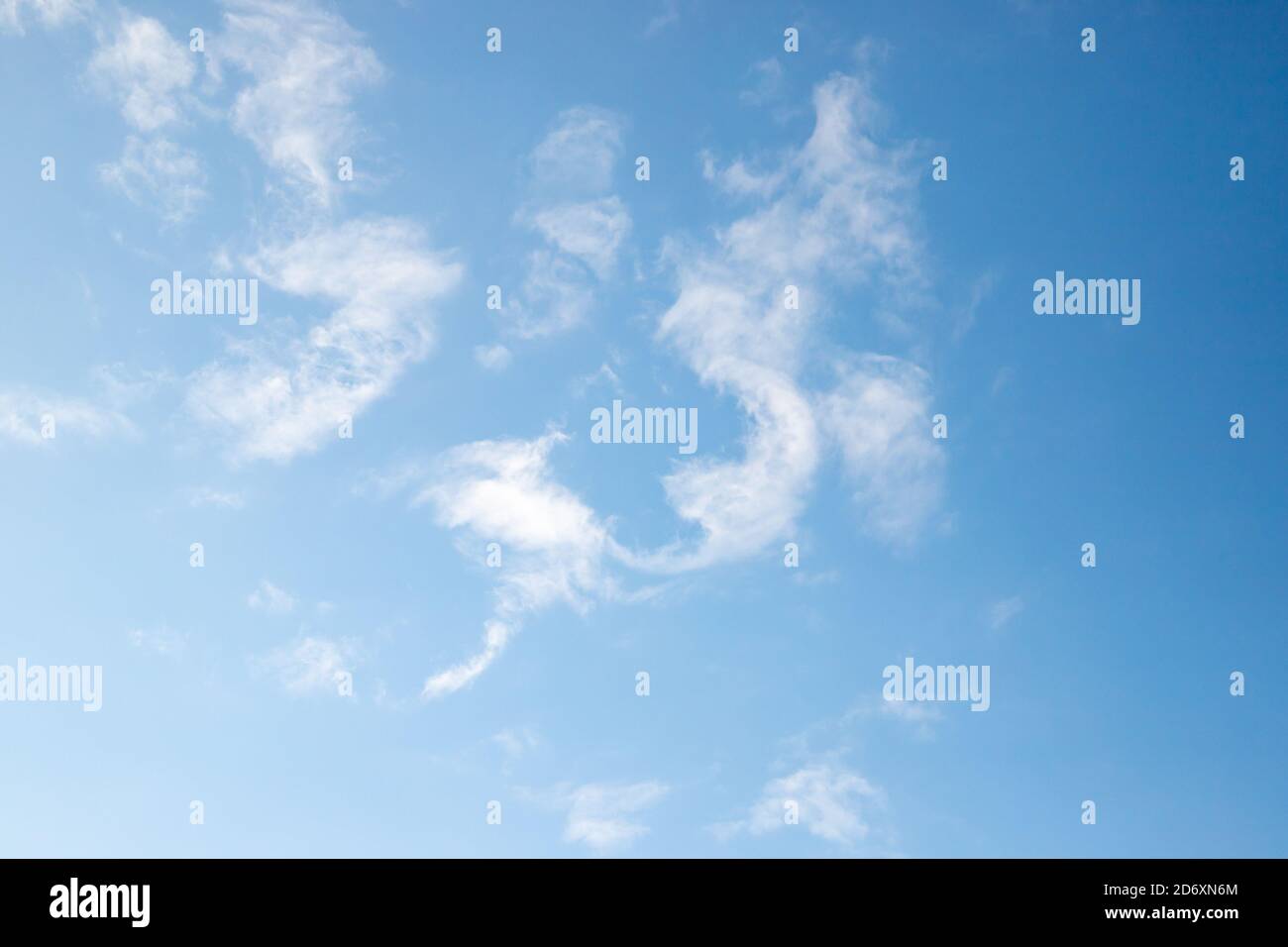Bright blue sky with white altocumulus clouds, natural background photo texture Stock Photo