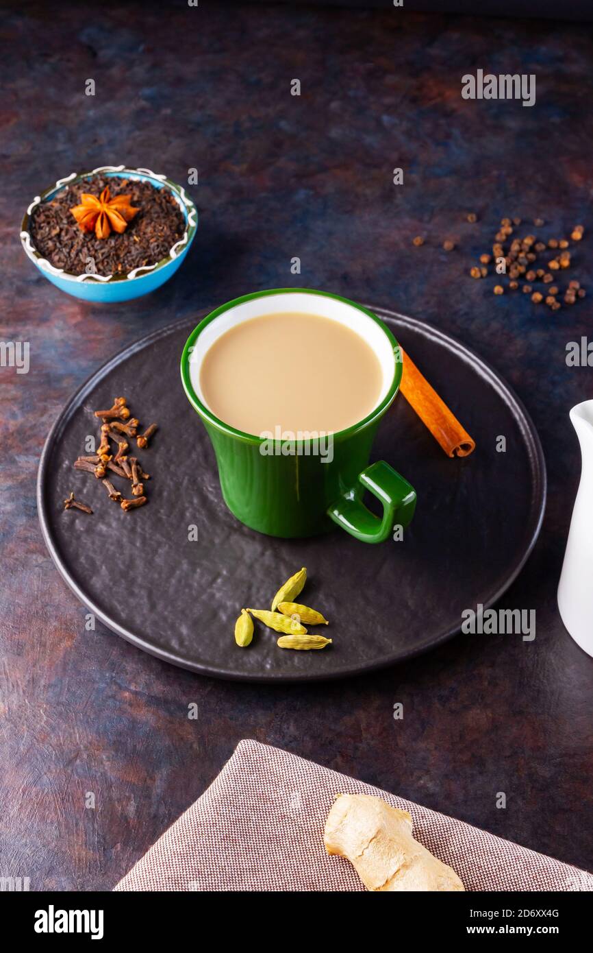 Masala chai tea. Traditional indian drink - masala tea with various ...