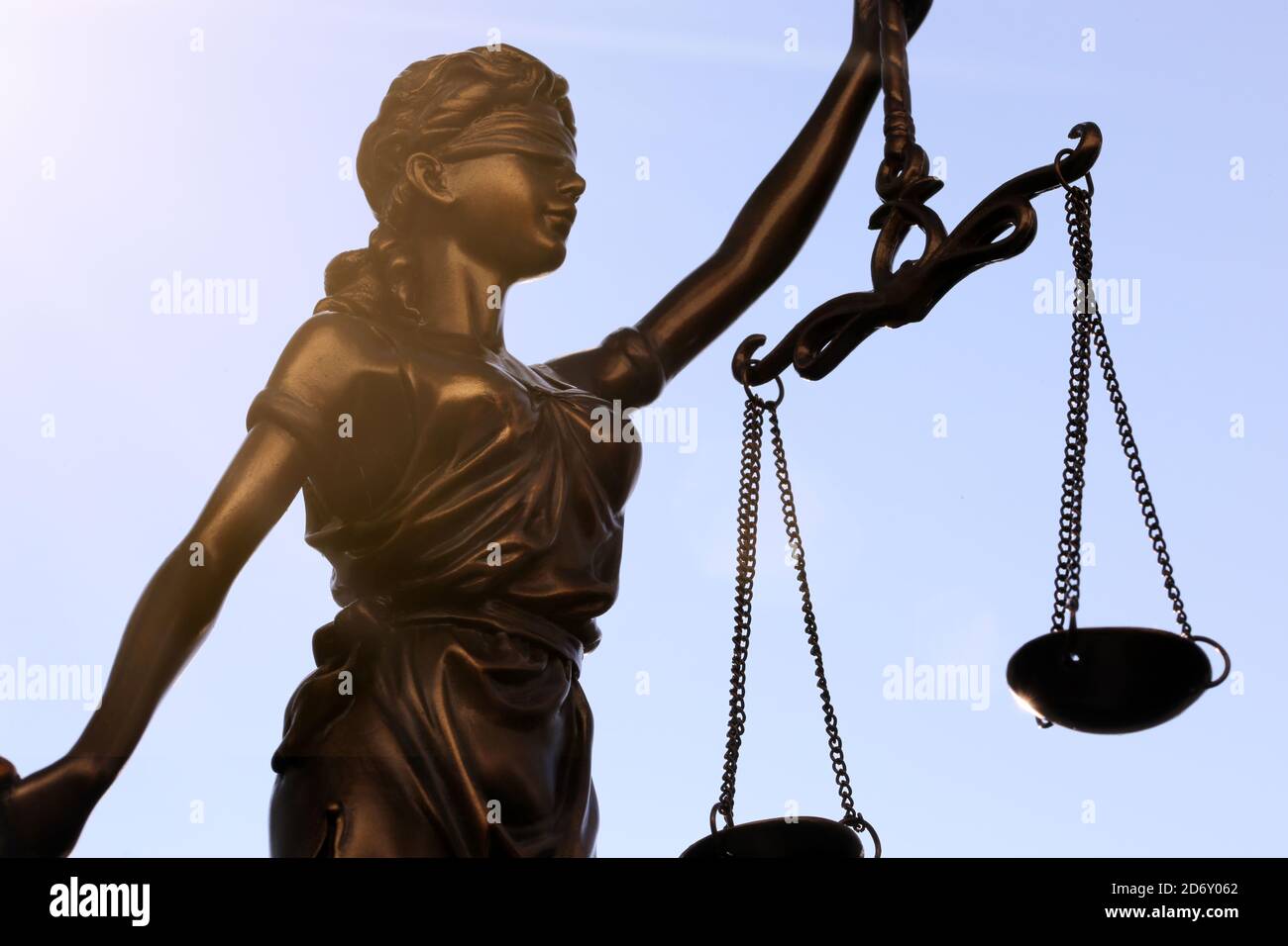 Close-up of a Justitia in front of a blue sky Stock Photo
