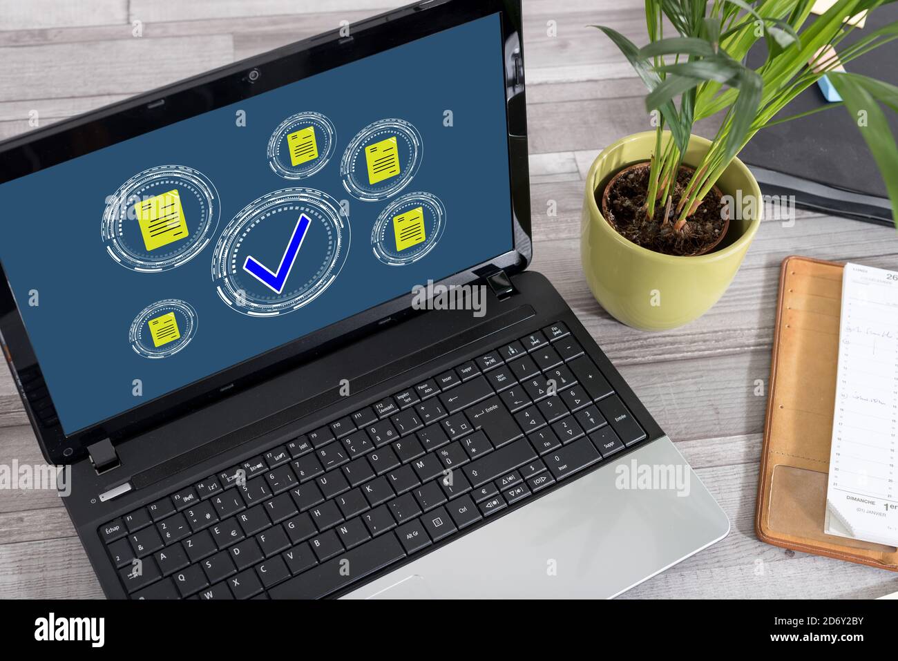 Computer Screen With Documents Laptop screen with document validation concept Stock Photo - Alamy