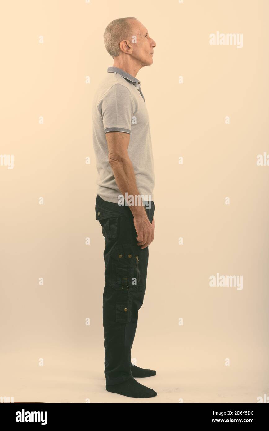 Man standing side full profile hi-res stock photography and images - Alamy