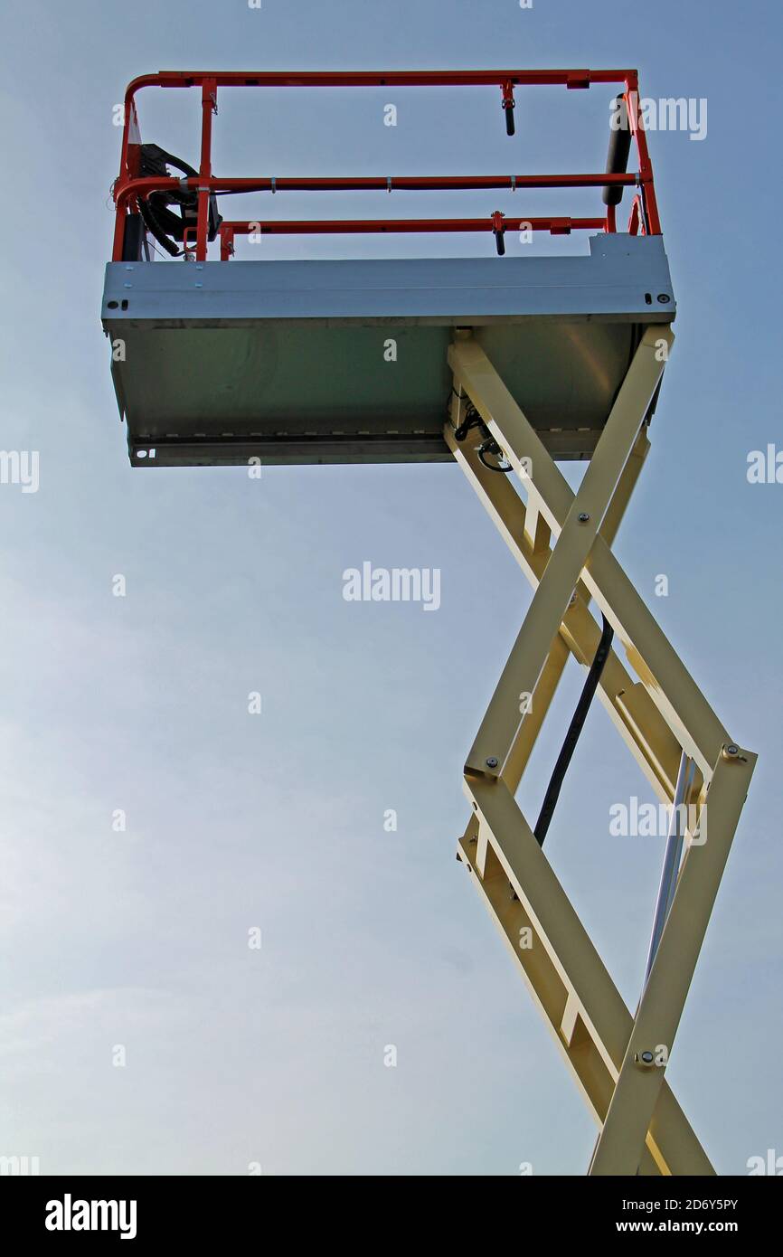 The Lifting Arm and Platform Cage of a Hydraulic Lift. Stock Photo
