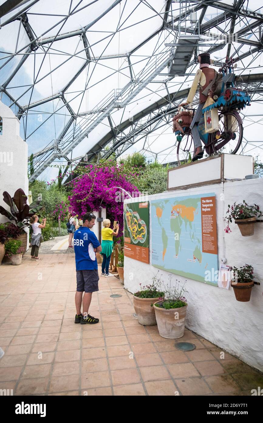 Visitors walking around the interior of the Mediterranean Biome at the Eden project complex in Cornwall. Stock Photo