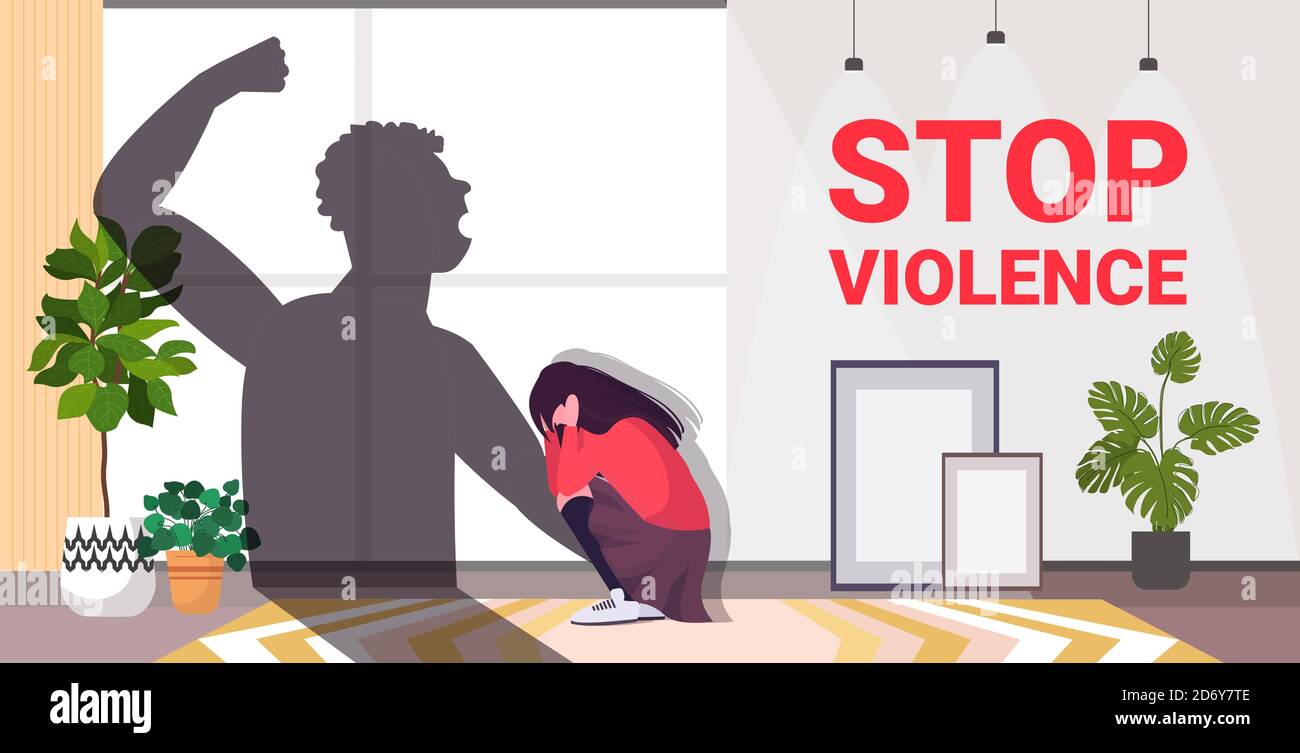 shadow of furious angry man raised punishment fist over scared or ...