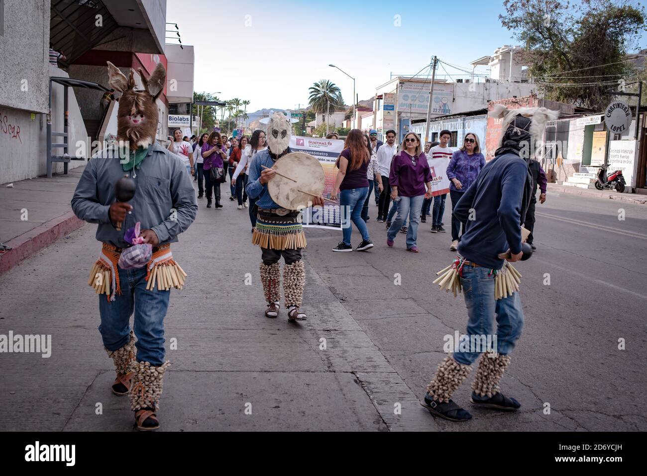 In Guaymas, Mexico, fariseos walk at the front of a women’s march against violence. Stock Photo