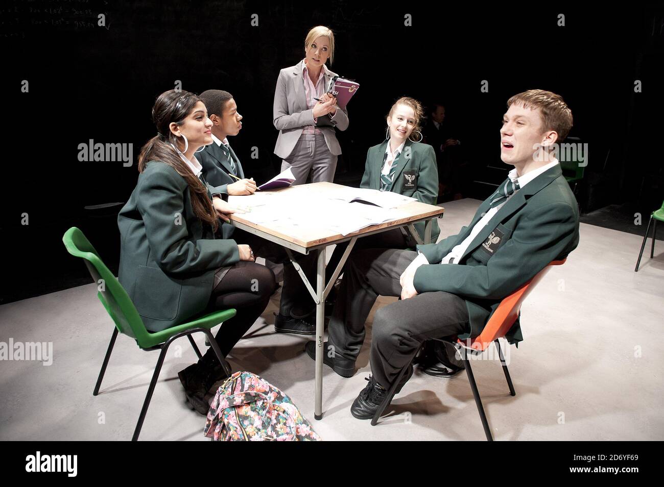 Joanne Froggatt (centre) performs scenes from The Knowledge, a new play by John Donnelly, at the Bush Theatre in west London. Stock Photo