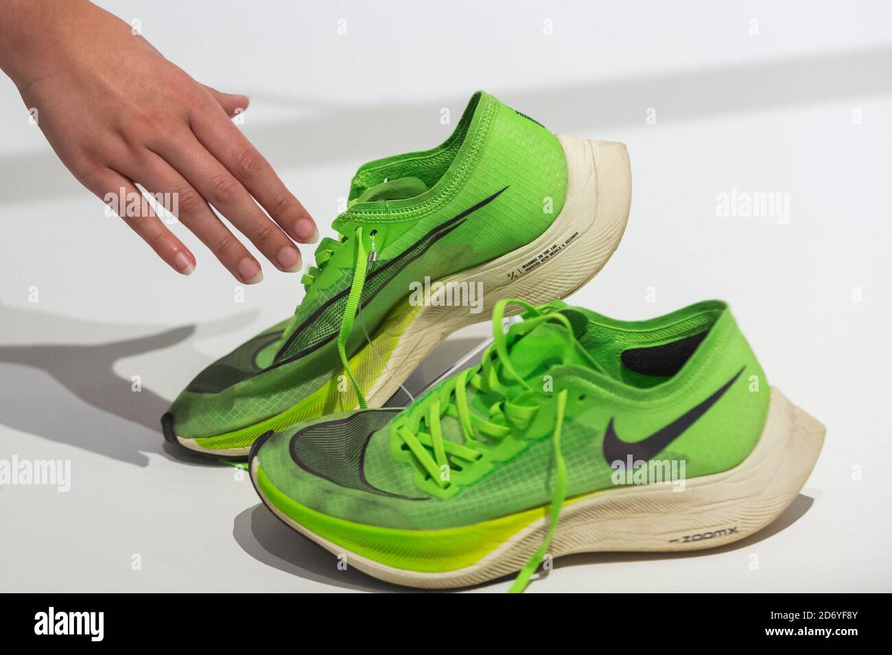 London, UK. 20 October 2020. The "Nike Zoom X Vaporfly NEXT%" running shoes  by designers at Nike Sport Research, as worn by Eliud Kipchoge to break the  two hour marathon barrier. Preview