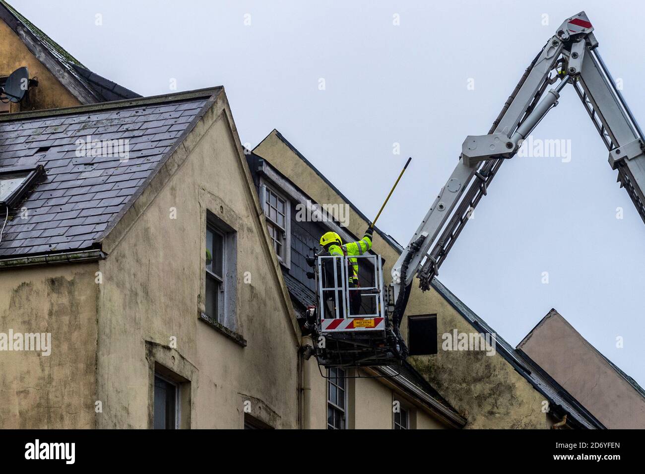 Cork, Ireland. 20th Oct, 2020. Slates fell off a building on the corner of Dunbar Street and George's Quay this morning, due to the high winds. The fire brigade attended to make the roof safe. The road was closed for a short time. Credit: AG News/Alamy Live News Stock Photo