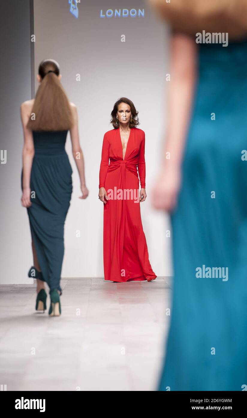 Former model Andrea Dellal on the catwalk at the Issa fashion show ...