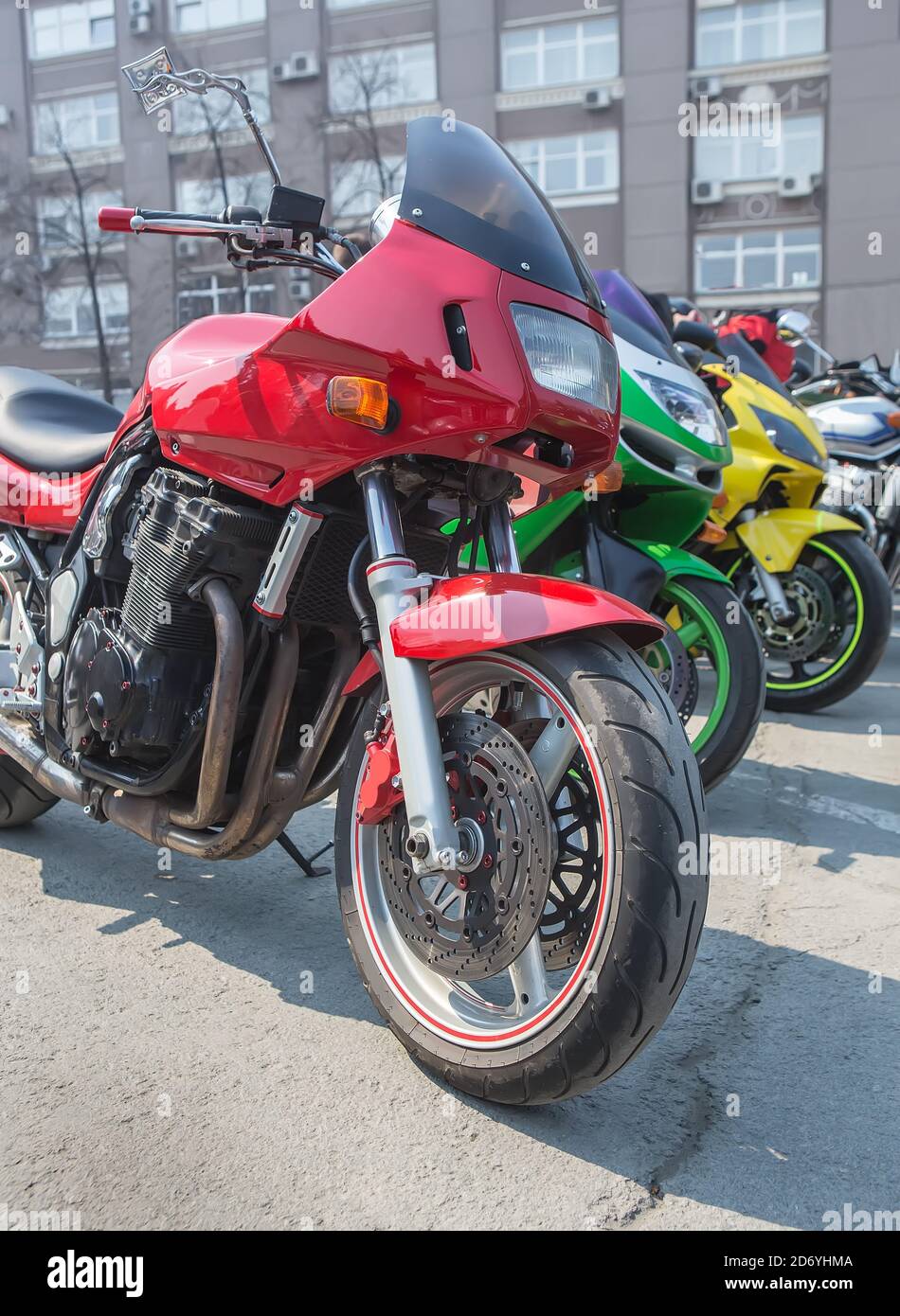 motorcycle in parking lot in row close up Stock Photo