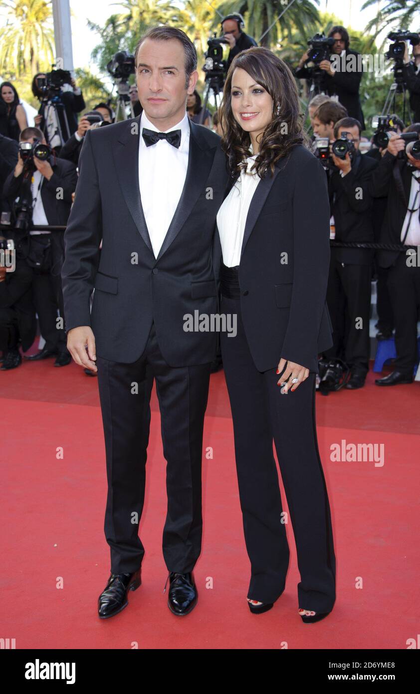 Berenice Bejo and Jean Dujardin arriving at the premiere of The Artist, during the 64th Cannes International Film Festival, at the Palais des Festivales in Cannes, France. Stock Photo