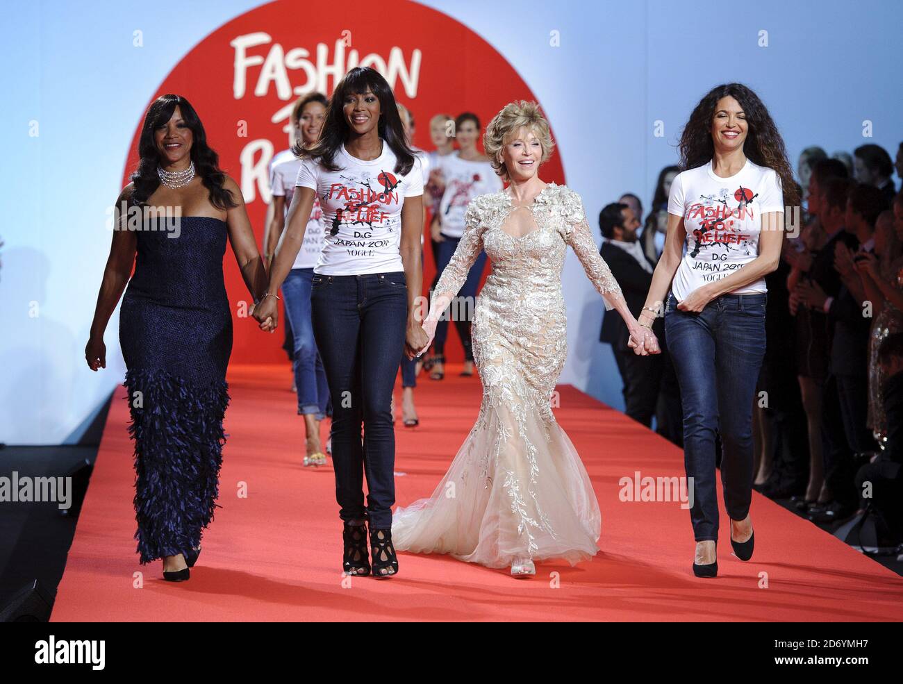 (l-r) Grace Hightower, Naomi Campbell, Jane Fonda and Afef Jnifen on the catwalk at the Fashion For Relief fashion show, held during the 64th Cannes International Film Festival in Cannes, France. Stock Photo