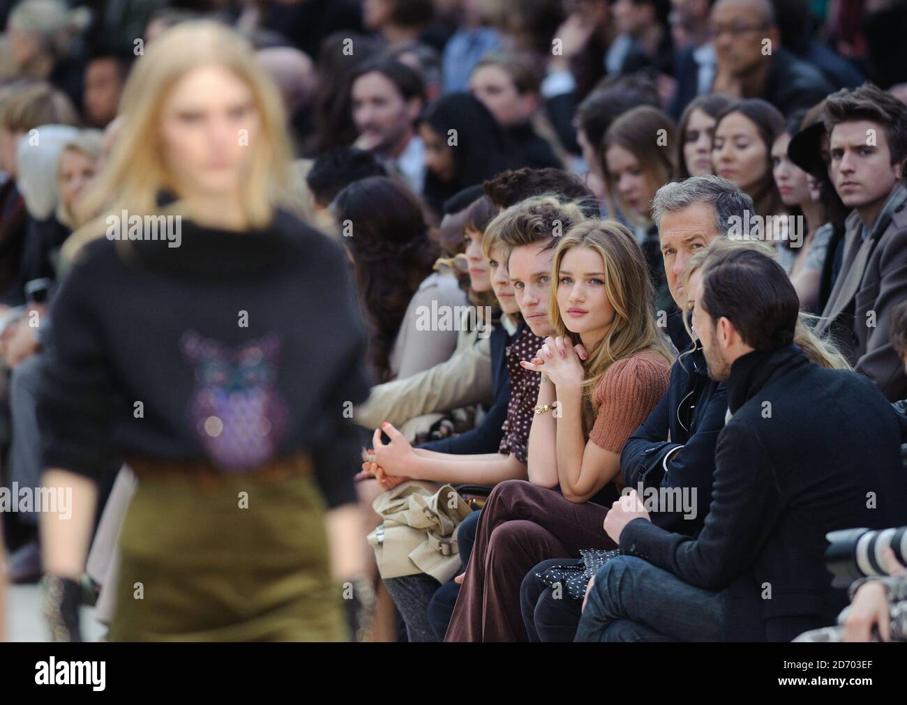 Will.I.am, Alexa Chung, Clemence Poesy, Eddie Redmayne, Rosie  Huntington-Whiteley and Mario Testino watching the Burberry Prorsum show at  Kensington Gore, London, during London Fashion Week Stock Photo - Alamy