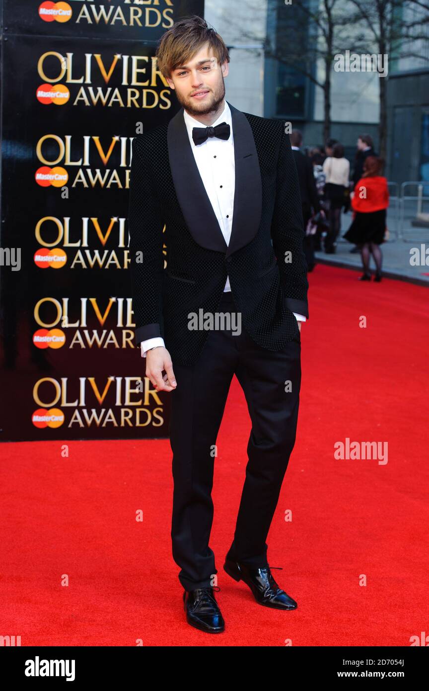 Douglas Booth arrives at the Olivier Awards, at the Royal Opera House in central London. Stock Photo