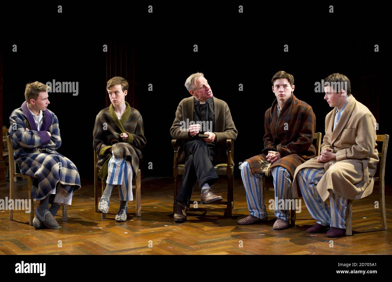 Nicholas Farrell (centre) performs scenes from South Downs, at the Harold Pinter Theatre in central London. Stock Photo