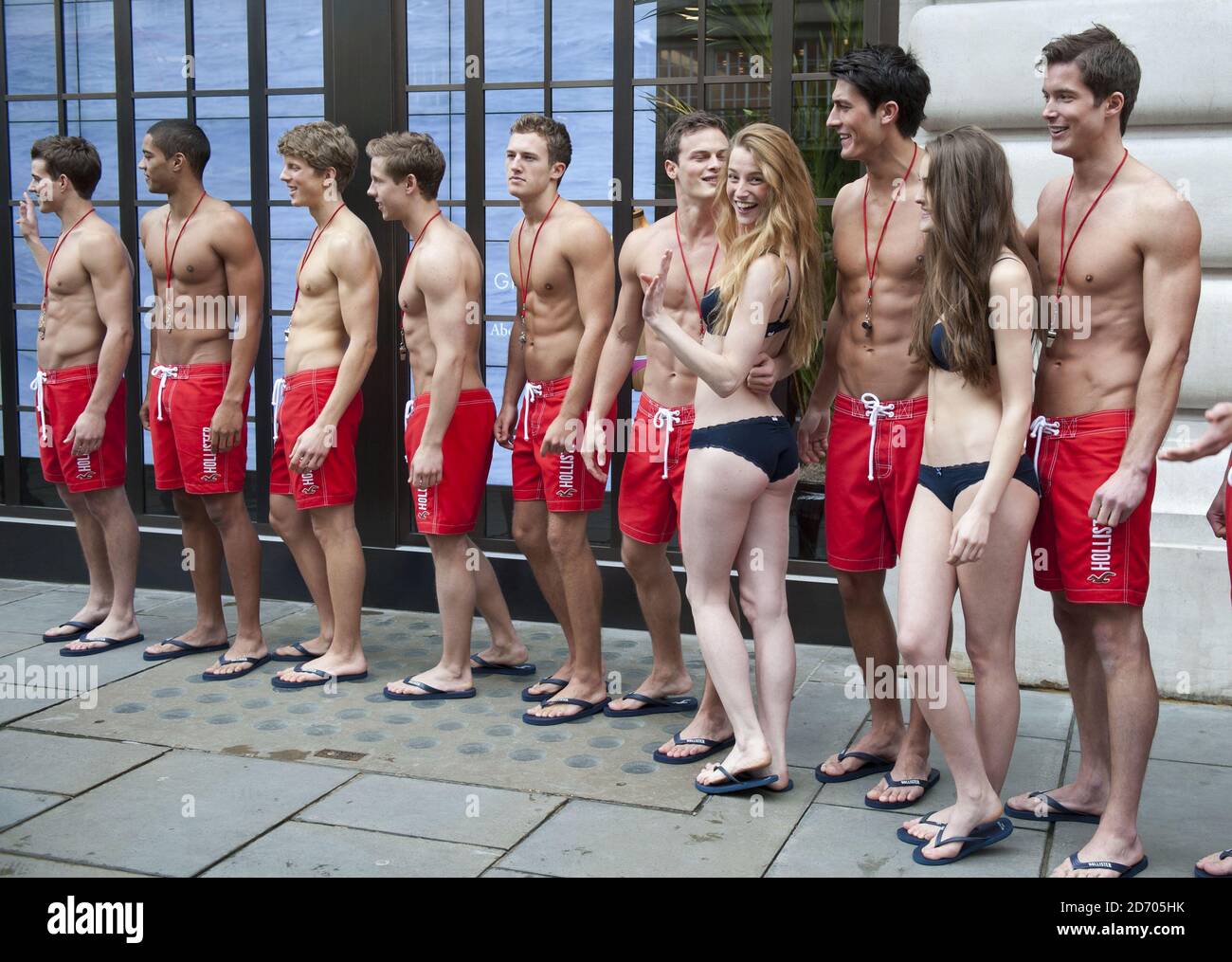 Models dressed as lifeguards pictured as they open the new Gilly Hicks and  Hollister flagship stores on Regent Street, London Stock Photo - Alamy