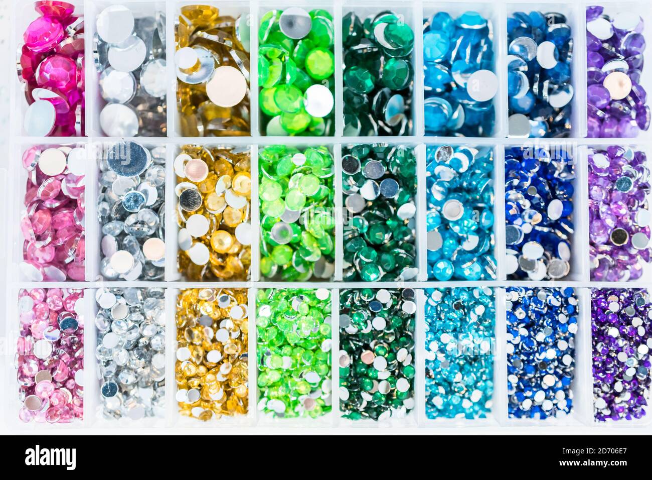 Comparing Craft Rhinestones Color and size variety of rhinestones in the craft box Stock Photo - Alamy