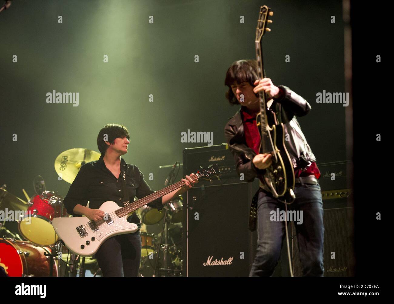 New bass player Debbie Googe and guitarist Andrew Innes performing with Primal Scream, on the eve of the Isle of Wight festival, at Seaclose Park. Stock Photo