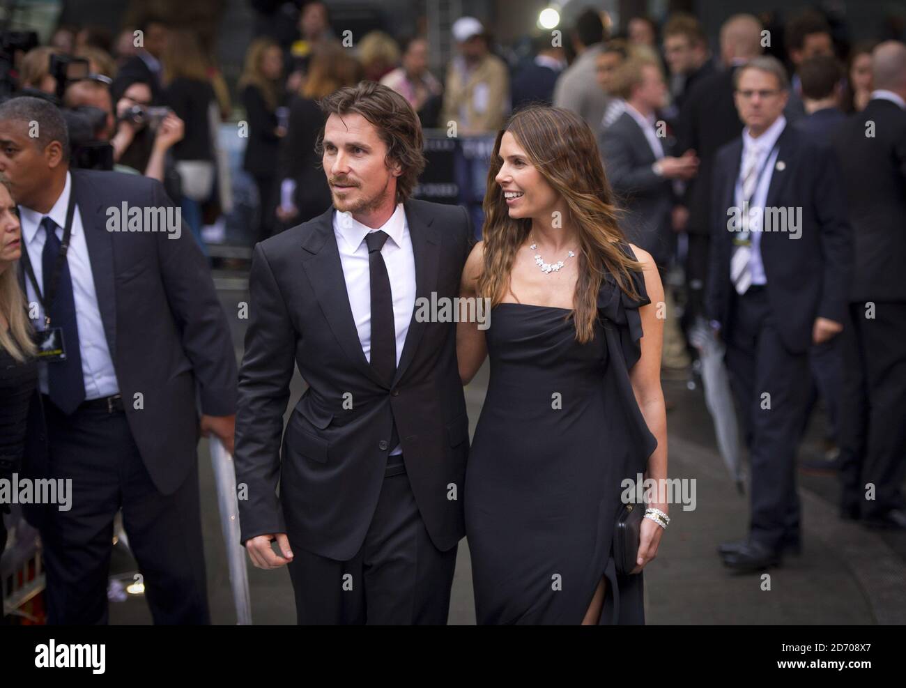 Christian Bale and Sibi Blazic arriving at the premiere of The Dark