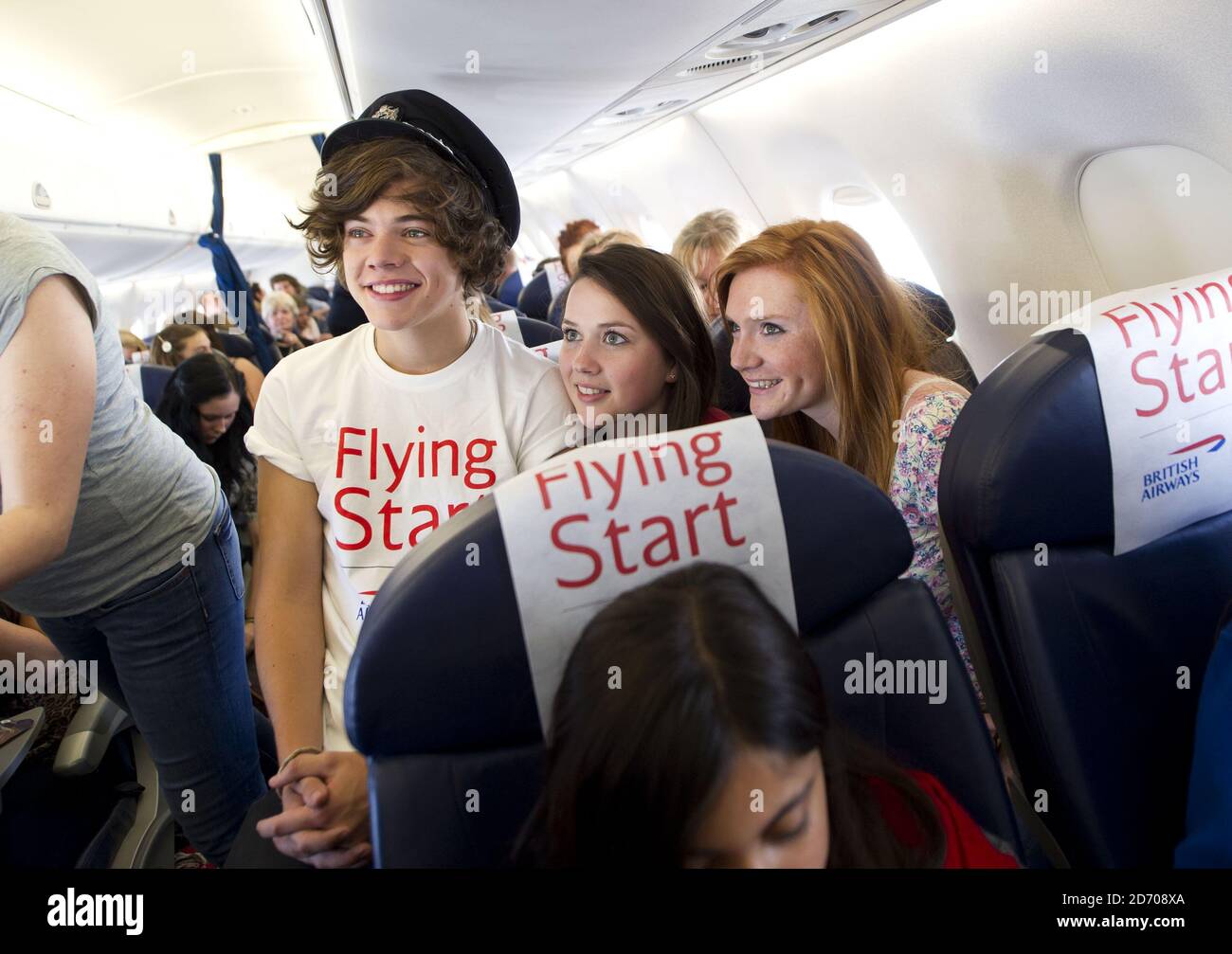 Harry Styles Of One Direction On Board Flight Ba1d A Private Charter Flight From London To Manchester Hosted By The Band For Competition Winners Which Raised A 50 000 For Flying Start