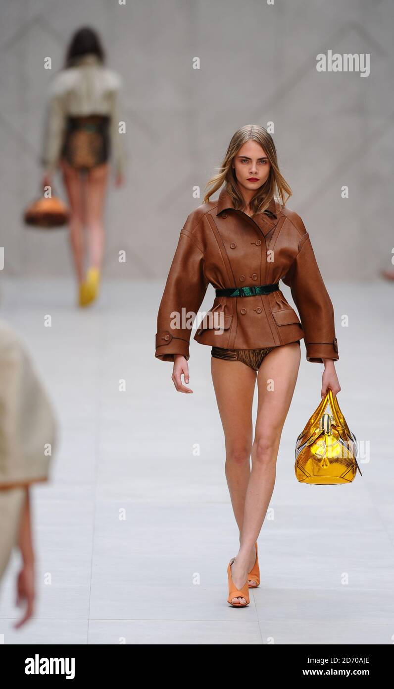 Model Cara Delevingne on the catwalk during the Burberry fashion show, held  in Hyde Park as part of London Fashion Week Stock Photo - Alamy