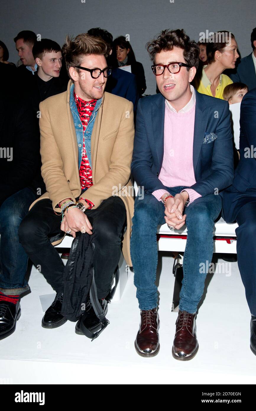 Henry Holland and Nick Grimshaw on the front row at the Mr Start fashion show, held as part of London Collections: Men, at the Hospital Club in Covent Garden. Stock Photo