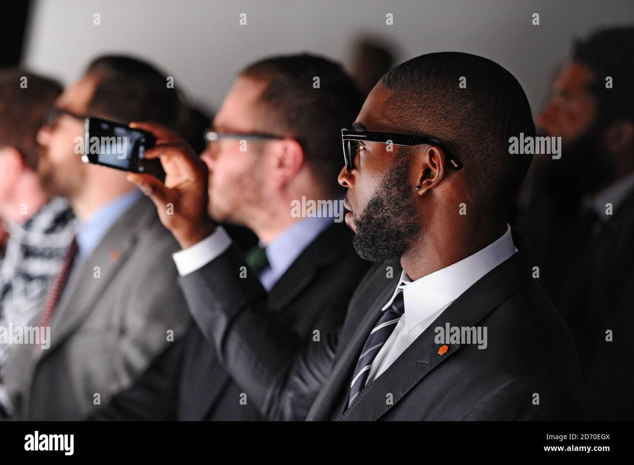 Tinie Tempah on the front row at the Mr Start fashion show, held as part of London Collections: Men, at the Hospital Club in Covent Garden. Stock Photo