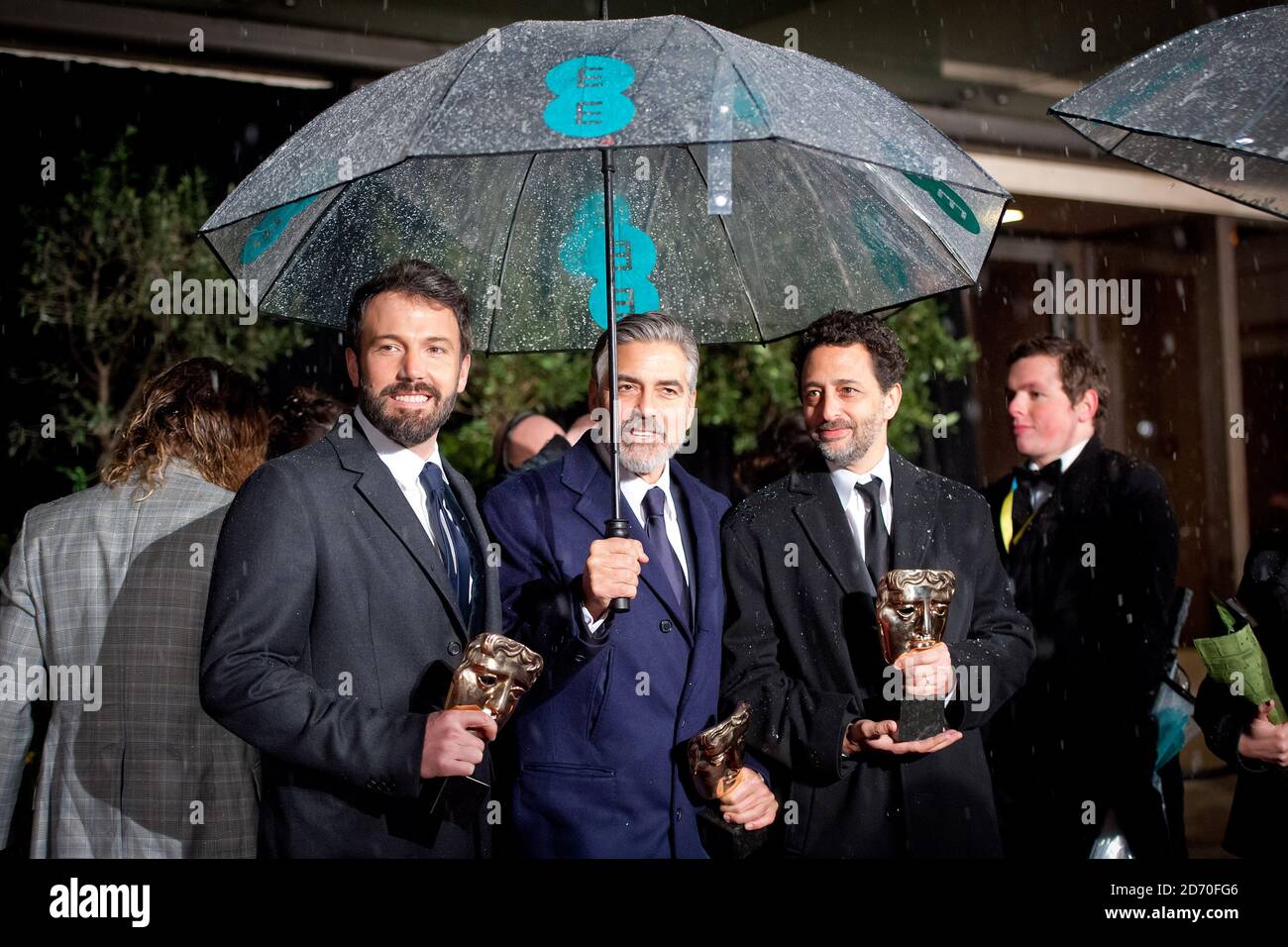 Ben Affleck, George Clooney and Grant Heslov attending the 2013 Bafta Film Awards after party, at the Grosvenor House Hotel in central London. Stock Photo