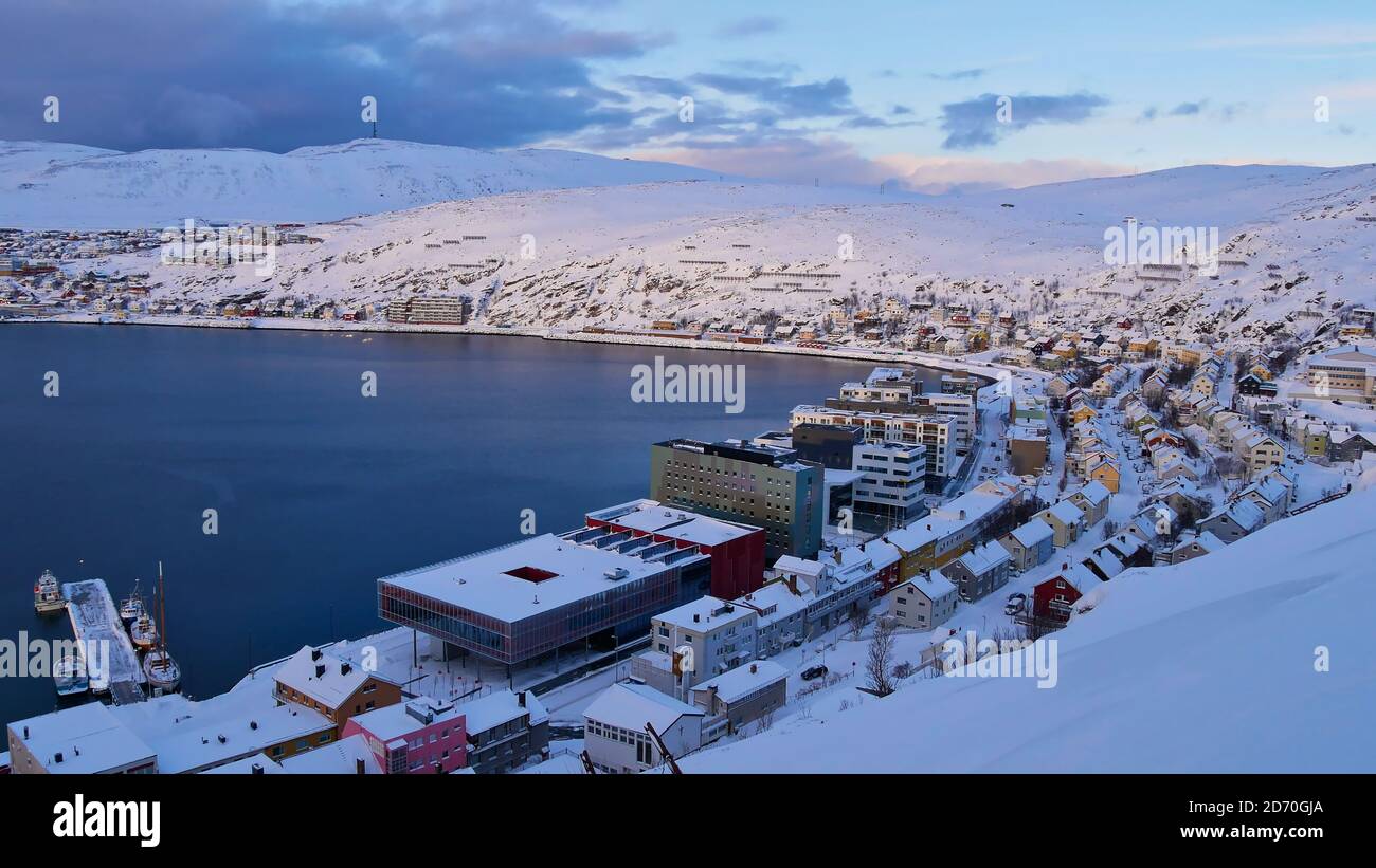 Panorama view of snow-covered city center of Hammerfest, Norway, Scandinavia, the northernmost town in the world, located at the coast of arctic sea. Stock Photo
