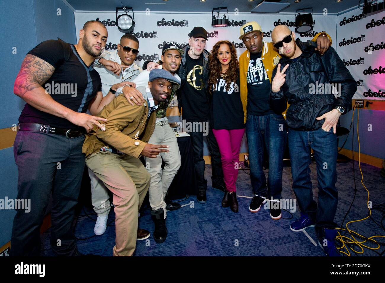 So Solid Crew members (l-r) Neutrino, Romeo, Swiss, Harvey, Oxide, Megaman, and Kaish pictured with presenter Max (centre) during a live session at Choice FM, London, which will be broadcast on Max's Weekend Session Show this Saturday 4-7pm. Stock Photo