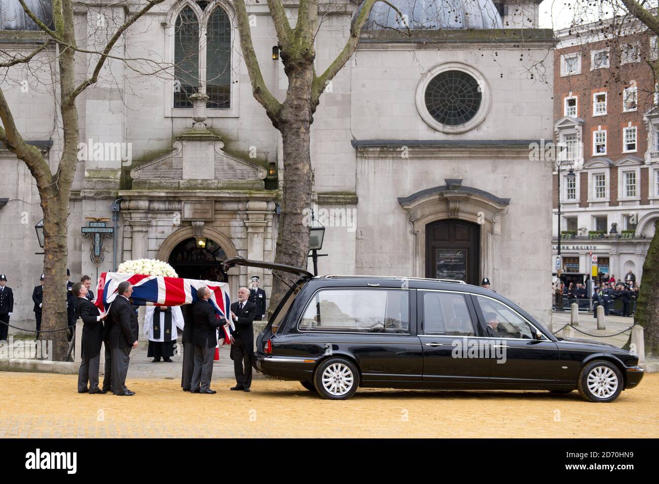 Baroness Thatcher's coffin arrives at St Celement Danes church before being loaded onto a waiting gun carriage. Stock Photo