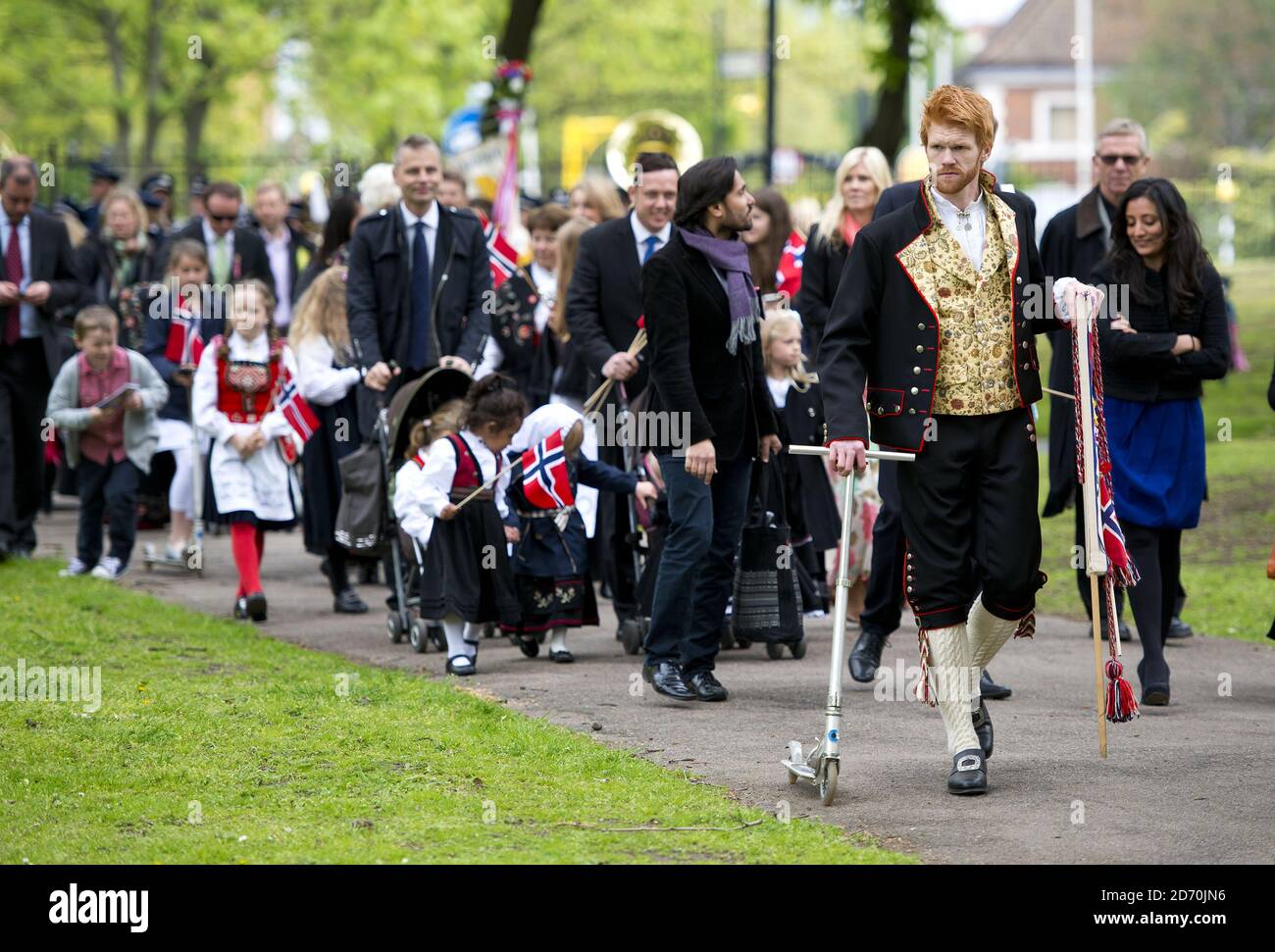 Guests in national dress attending the Norwegian National Day Celebrations, at the Norwegian Church in Rotherithe, London. Stock Photo