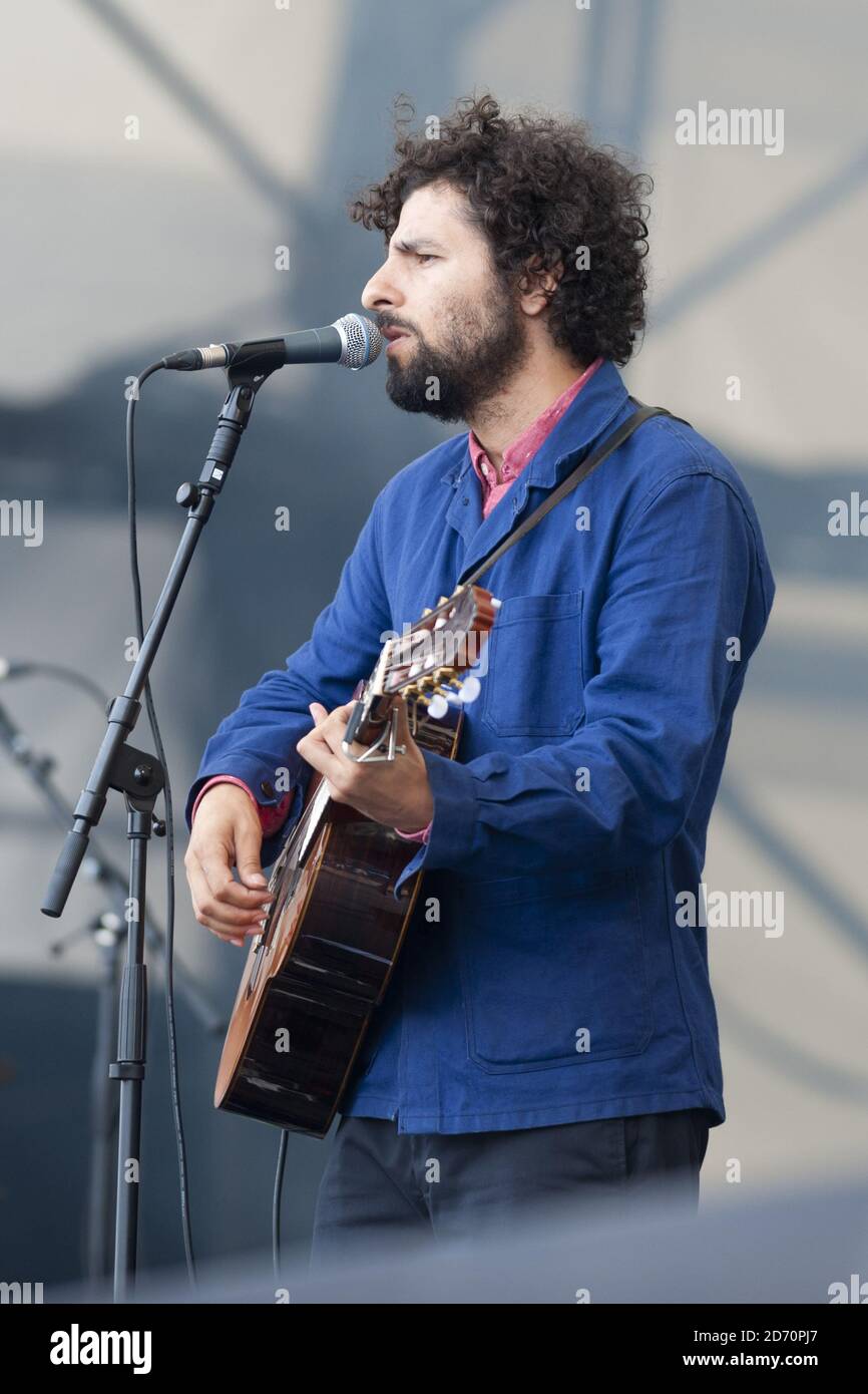 Jose Gonzales performing on the third day of the Latitude Festival, at Henham Park in Southwold, Suffolk. Stock Photo