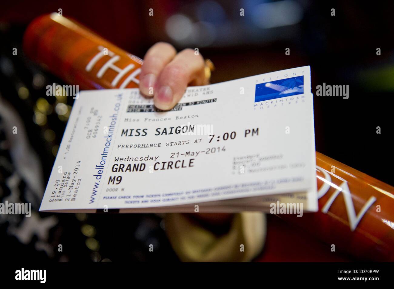 Theatre-goers buy tickets for Miss Saigon, at the Prince Edward theatre in central London. Tickets for the show (opening May 2014) went on sale at 10am today, and sales set a new record for the largest single day of sales in West End and Broadway history. Stock Photo