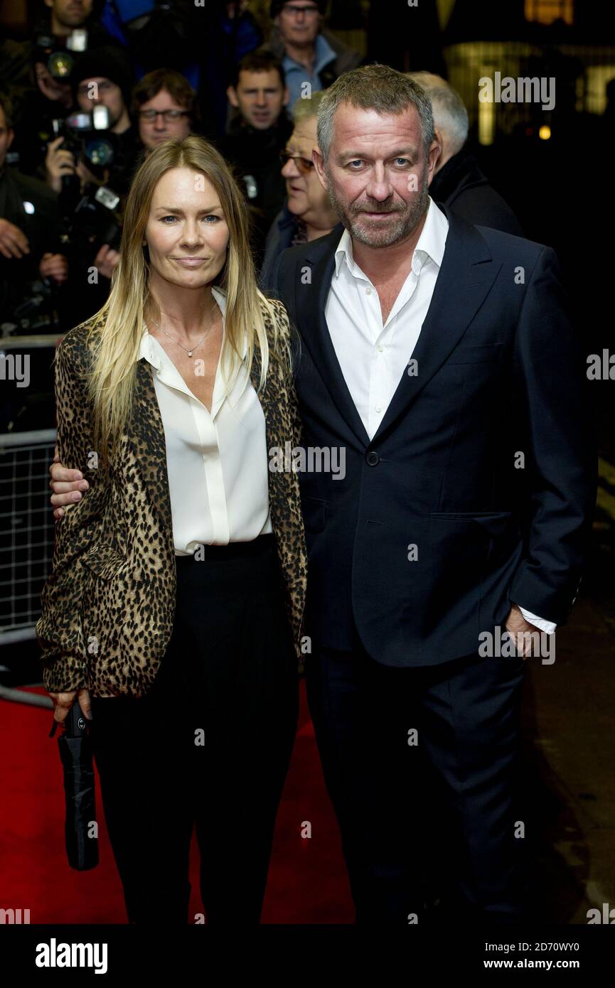 Sean Pertwee and wife Jacqui Hamilton-Smith attending the screening of Dom Hemingway, at the Curzon Cinema in Mayfair, London. Stock Photo