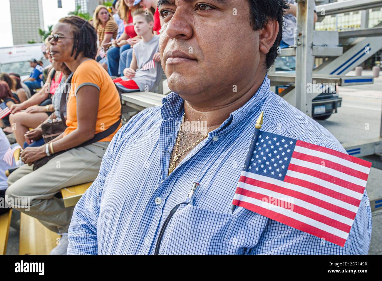 Miami Florida,Biscayne Boulevard Bayfront Park,Veterans Day Parade Ceremonies,Hispanic man male small miniature flag, Stock Photo