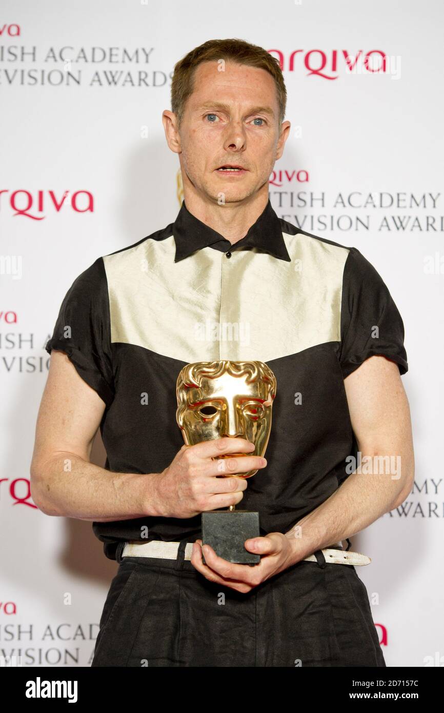 Sean Harris with the Leading Actor Award for Southcliffe, in the press room at the 2014 Arqiva British Academy Television Awards at the Theatre Royal, Drury Lane, London. Stock Photo
