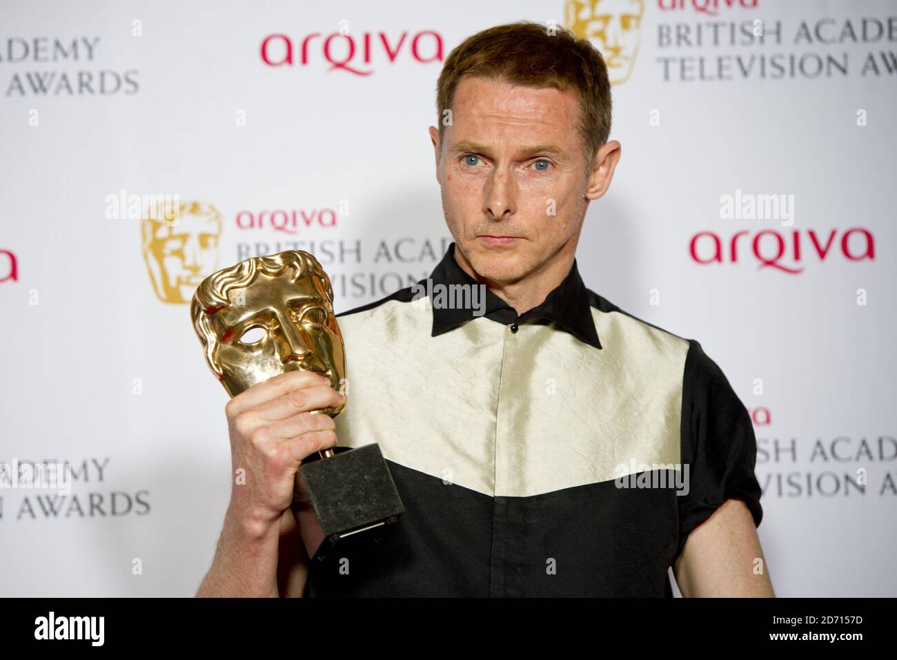 Sean Harris with the Leading Actor Award for Southcliffe, in the press room at the 2014 Arqiva British Academy Television Awards at the Theatre Royal, Drury Lane, London. Stock Photo