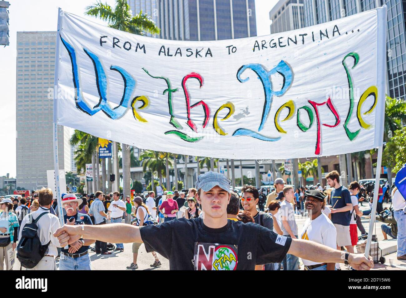Miami Florida,Biscayne Boulevard,Free Trade Area of Americans Summit FTAA demonstrations,protester holding banner we the people, Stock Photo