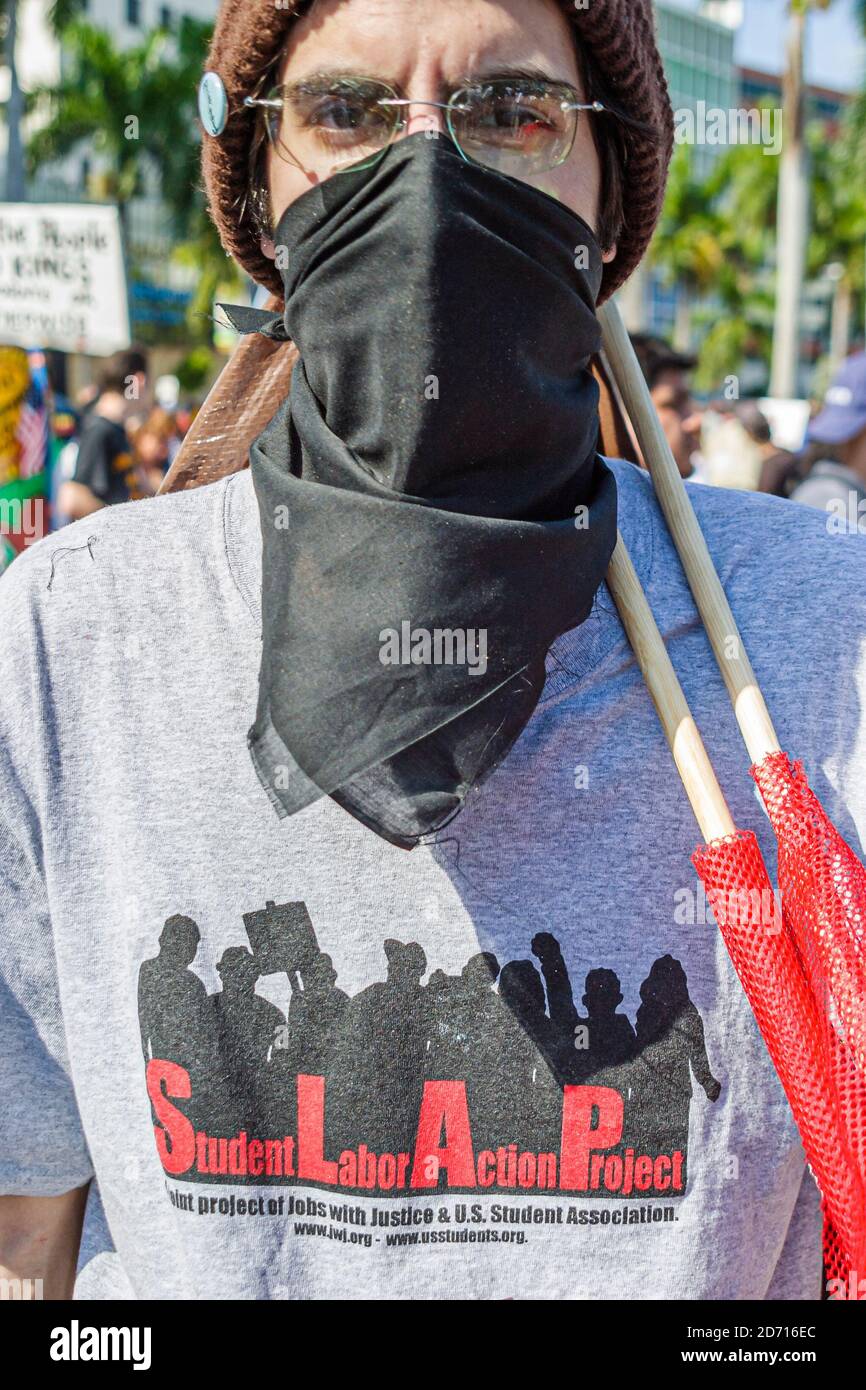 Miami Florida,Biscayne Boulevard,Free Trade Area of Americans Summit FTAA demonstrations,protester face covering covered SLAP, Stock Photo