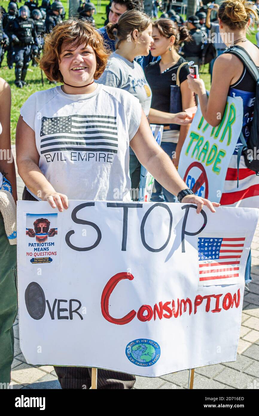 Miami Florida,Biscayne Boulevard,Free Trade Area of Americans Summit FTAA demonstrations,protester girl holding poster sign, Stock Photo