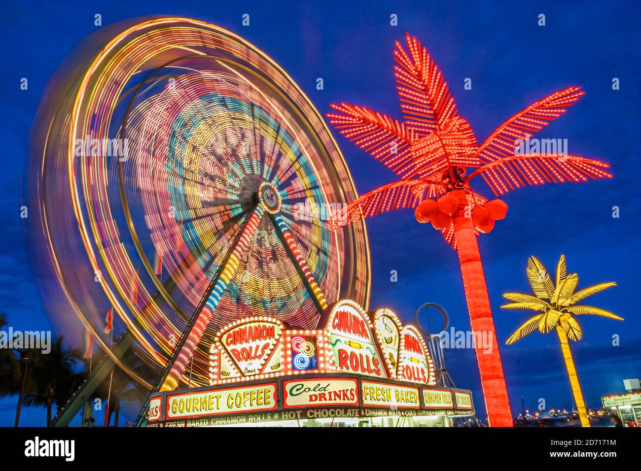 Miami Florida,Bayfront Park Downtown's Holiday Village,Ferris Wheel carnival ride midway artificial palm trees,American Americans night, Stock Photo