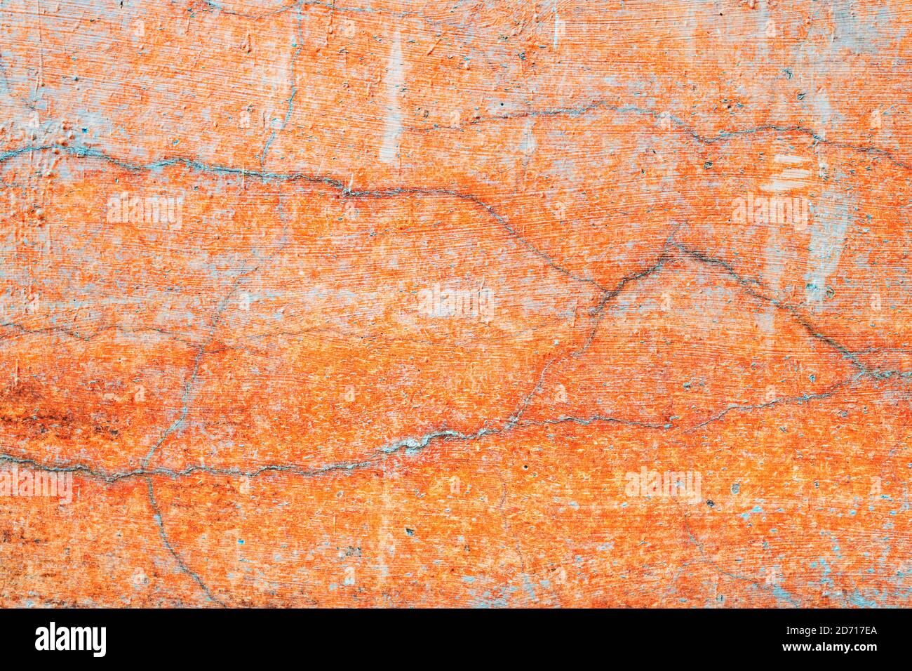 Grunge orange concrete wall surface as background, cracked texture of