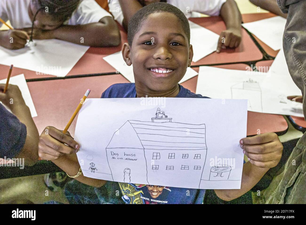 Miami Florida,Little Haiti Edison Park Elementary School,student boy kid child Black shows showing drawing,art artwork displays displaying, Stock Photo